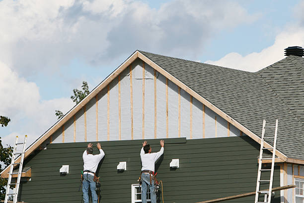 Professional Siding Installation technician working in Bushwood, MD